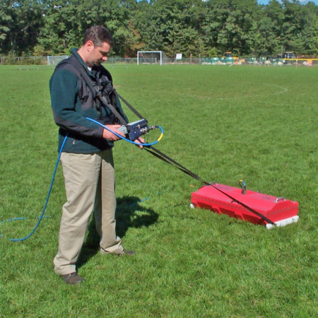 Man using the 100 MHz antenna for deep subsurface applications